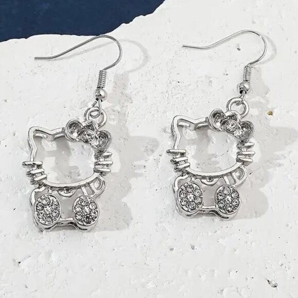 Sanrio Jewelry - 4/20 Sanrio Hello Kitty Sivertone Earrings with Rhinestone Inlay